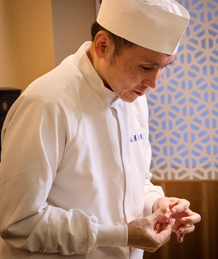 写真：亀屋良長 8代目当主 代表取締役 吉村良和